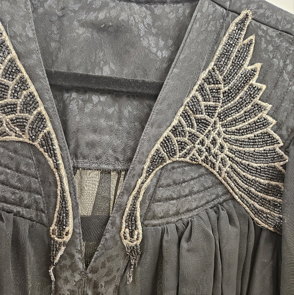 Beautiful swan detailed dress in black - Picture 2 of 5